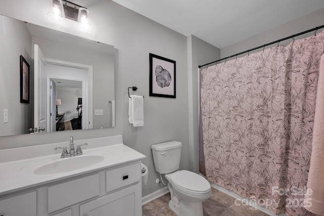 1315 Elizabeth Ave, Kannapolis, NC 28083 - bathroom with vanity and a shower with shower curtain