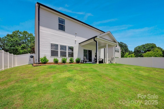 1315 Elizabeth Ave, Kannapolis, NC 28083 - back of house with a fenced backyard