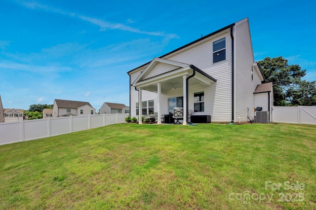 1315 Elizabeth Ave, Kannapolis, NC 28083 - back of property featuring a fenced backyard and a patio