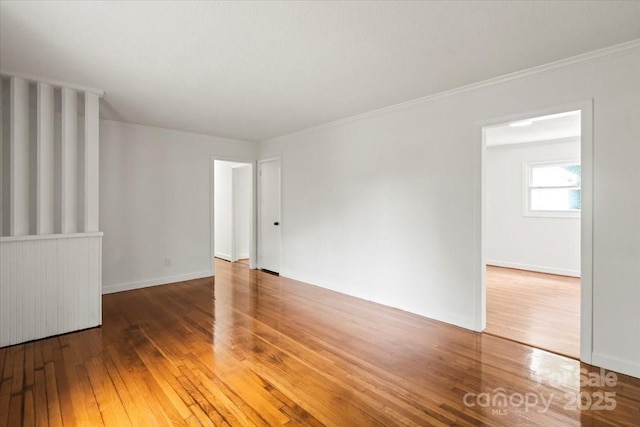 1512 Anthony Dr, Gastonia, NC 28052 - spare room with hardwood / wood-style flooring and ornamental molding