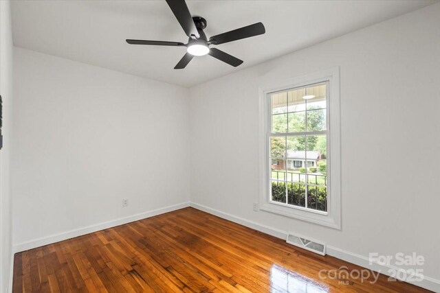 1512 Anthony Dr, Gastonia, NC 28052 - spare room featuring hardwood / wood-style flooring and a ceiling fan