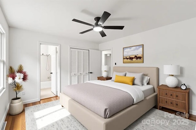 1512 Anthony Dr, Gastonia, NC 28052 - bedroom with light wood-type flooring, a closet, ensuite bathroom, and a ceiling fan