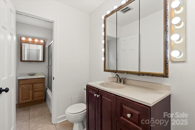 1512 Anthony Dr, Gastonia, NC 28052 - bathroom with vanity, tile patterned flooring, and bath / shower combo with glass door