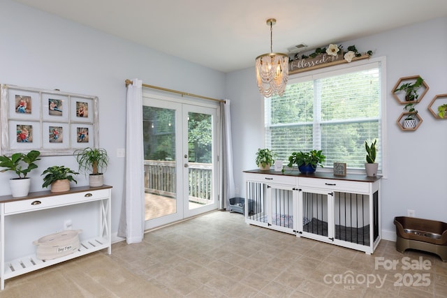 2405 Emma Grace Ln, Rock Hill, SC 29732 - dining area featuring a chandelier and baseboards