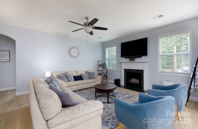 2405 Emma Grace Ln, Rock Hill, SC 29732 - living room with ceiling fan, a premium fireplace, and light carpet