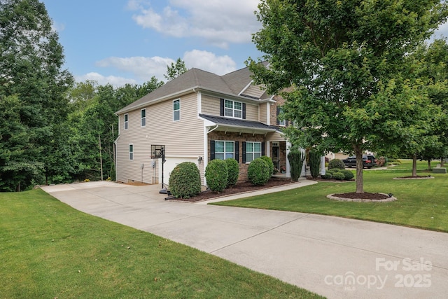 2405 Emma Grace Ln, Rock Hill, SC 29732 - view of front of house featuring a front yard, concrete driveway, and a garage