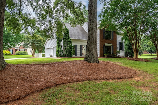 13403 Kensal Green Dr, Charlotte, NC 28278 - view of front of property with a front lawn, driveway, and an attached garage
