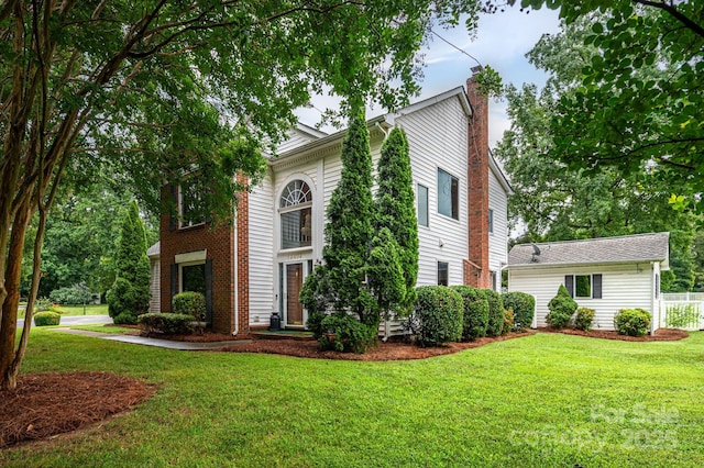 13403 Kensal Green Dr, Charlotte, NC 28278 - colonial house with a chimney and a front lawn