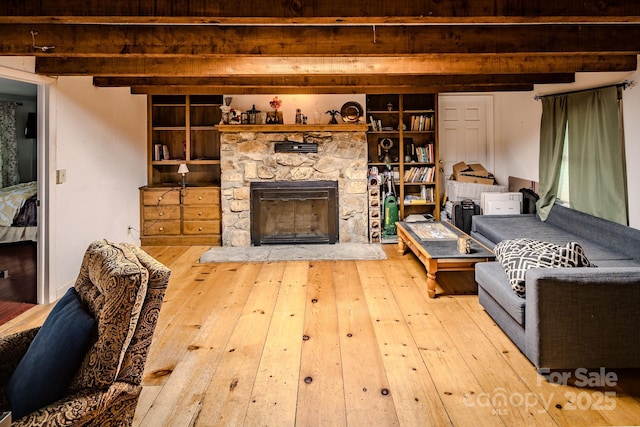 4584 NC Highway 194 S, Banner Elk, NC 28604 - living area featuring beam ceiling, hardwood / wood-style flooring, and a fireplace
