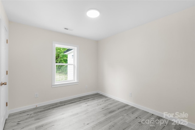 1017 W Fisher St, Salisbury, NC 28144 - unfurnished room featuring light wood-style flooring