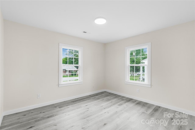 1017 W Fisher St, Salisbury, NC 28144 - spare room with wood finished floors and healthy amount of natural light