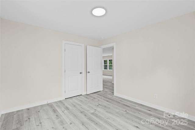 1017 W Fisher St, Salisbury, NC 28144 - spare room featuring wood finished floors and baseboards
