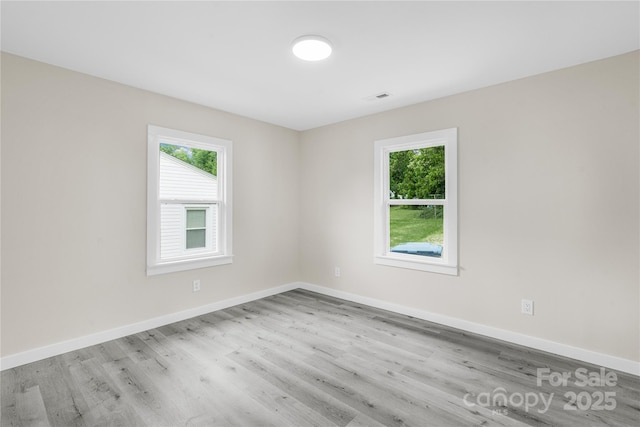 1017 W Fisher St, Salisbury, NC 28144 - empty room featuring wood finished floors and baseboards