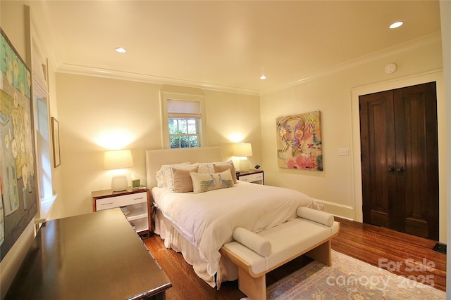 1137 Queens Rd W, Charlotte, NC 28207 - bedroom featuring dark wood-type flooring, crown molding, and recessed lighting