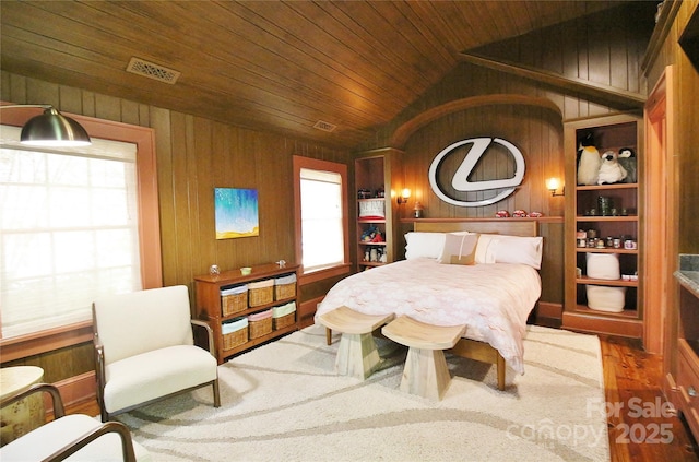1137 Queens Rd W, Charlotte, NC 28207 - bedroom with wooden walls, vaulted ceiling, wooden ceiling, and wood finished floors