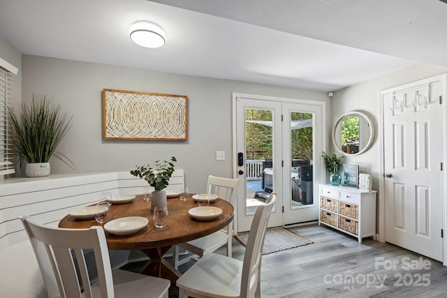 174 Ridge Rd, Lake Lure, NC 28746 - dining area with light wood finished floors and french doors