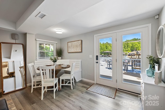 174 Ridge Rd, Lake Lure, NC 28746 - dining space featuring wood finished floors