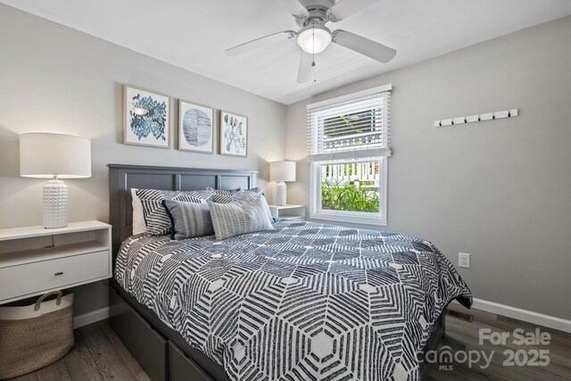 174 Ridge Rd, Lake Lure, NC 28746 - bedroom with wood finished floors and ceiling fan
