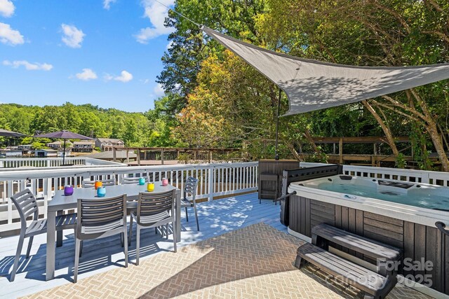 174 Ridge Rd, Lake Lure, NC 28746 - view of patio / terrace featuring a hot tub, a deck, and outdoor dining space
