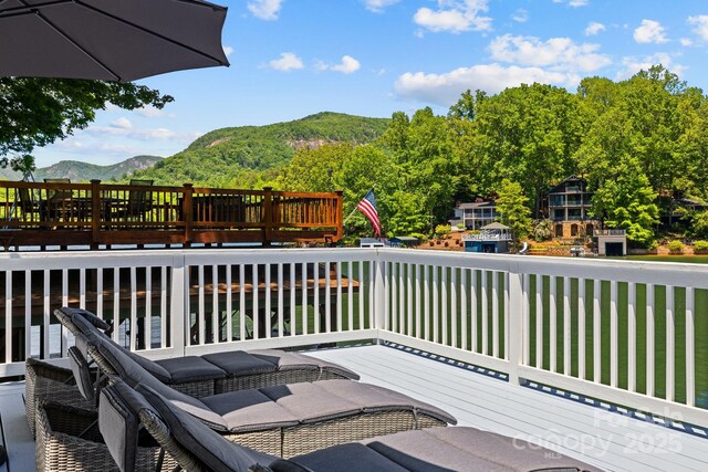 174 Ridge Rd, Lake Lure, NC 28746 - wooden terrace with a mountain view