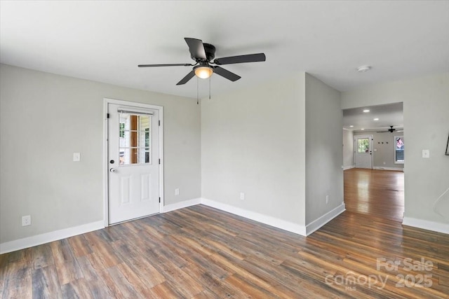 321 E Taylor St, Landis, NC 28088 - empty room with ceiling fan, plenty of natural light, and wood finished floors