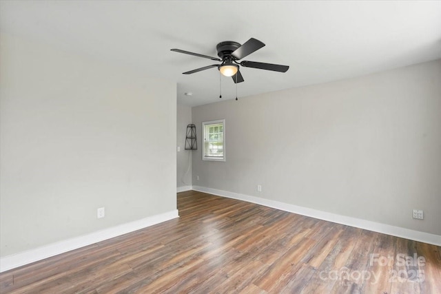 321 E Taylor St, Landis, NC 28088 - unfurnished room featuring wood finished floors, baseboards, and ceiling fan
