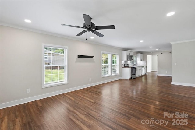 321 E Taylor St, Landis, NC 28088 - unfurnished living room featuring ornamental molding, recessed lighting, a ceiling fan, baseboards, and dark wood finished floors