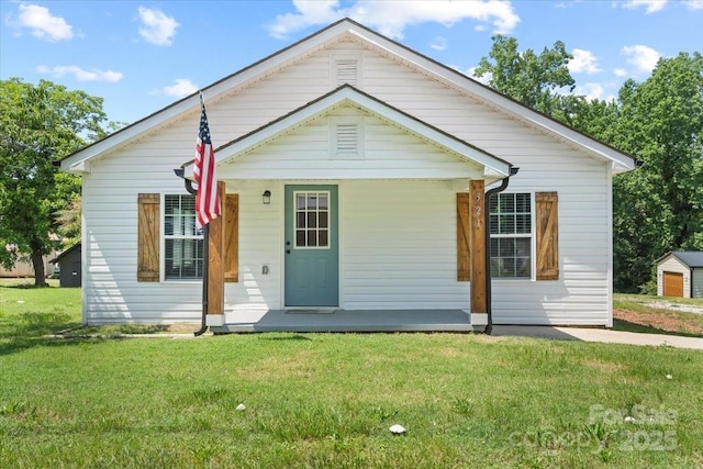 321 E Taylor St, Landis, NC 28088 - view of front of property featuring a front lawn and covered porch