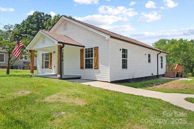 321 E Taylor St, Landis, NC 28088 - view of front of house with a front yard and covered porch