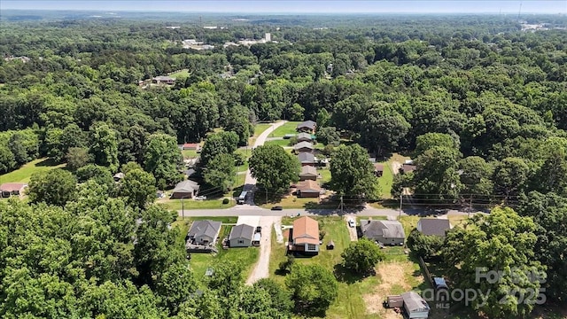 321 E Taylor St, Landis, NC 28088 - aerial view of property's location with a heavily wooded area and nearby suburban area