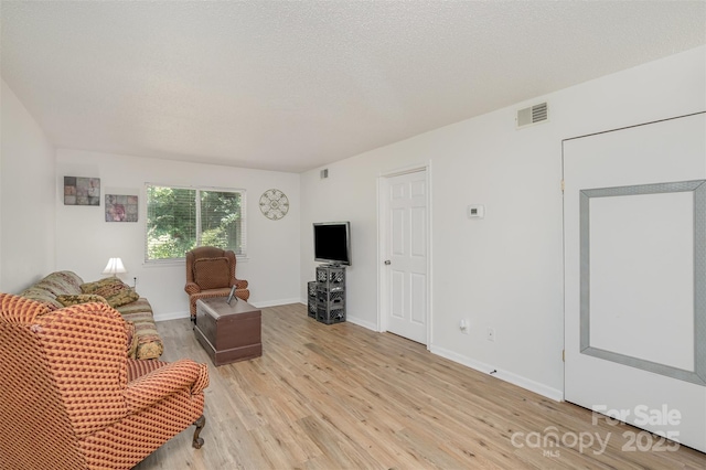 1602 Eagles Pl Unit J103, Rock Hill, SC 29732 - living area featuring light wood-style flooring and baseboards
