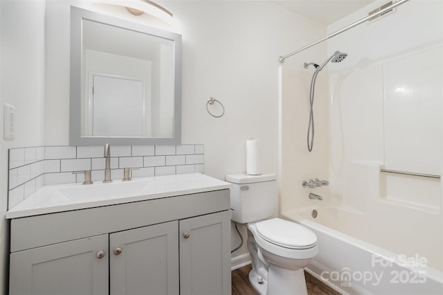 1602 Eagles Pl Unit J103, Rock Hill, SC 29732 - full bath featuring vanity, decorative backsplash, washtub / shower combination, and wood finished floors