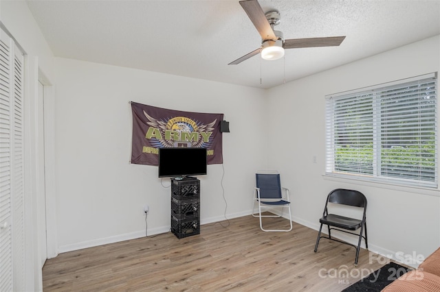 1602 Eagles Pl Unit J103, Rock Hill, SC 29732 - living area featuring wood finished floors and ceiling fan