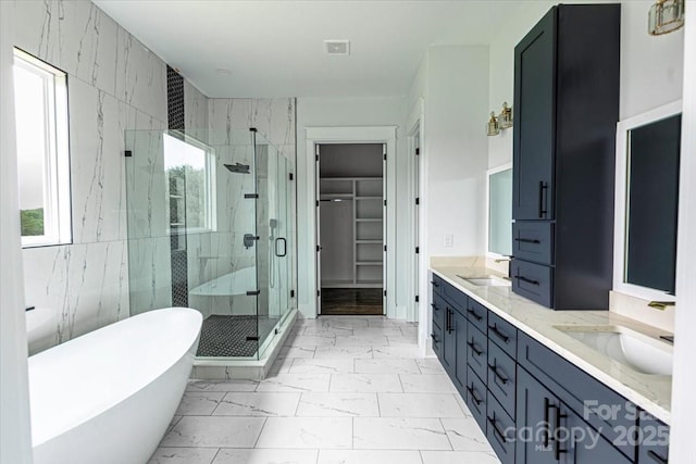 115 Augusta Ln, Shelby, NC 28150 - full bathroom with marble finish flooring, a stall shower, healthy amount of natural light, and a freestanding bath