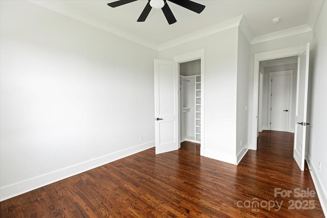 115 Augusta Ln, Shelby, NC 28150 - unfurnished bedroom with dark wood-style floors, baseboards, ornamental molding, ceiling fan, and a closet