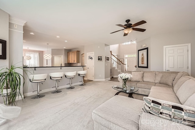 5832 Lagrande Dr, Charlotte, NC 28269 - living room featuring baseboards, light carpet, stairs, recessed lighting, and a ceiling fan