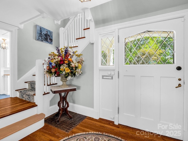 287 Pacolet Ridge Ln, Tryon, NC 28782 - foyer with stairway, wood finished floors, and a chandelier
