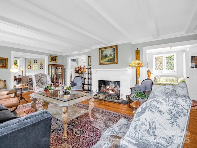 287 Pacolet Ridge Ln, Tryon, NC 28782 - living room with a brick fireplace, beam ceiling, and wood finished floors
