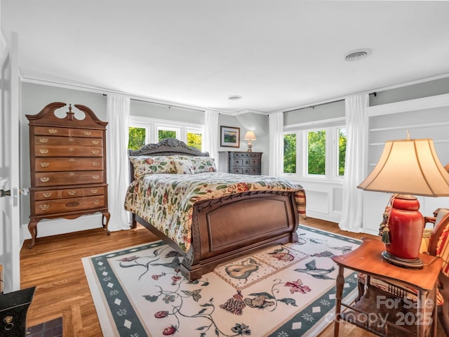 287 Pacolet Ridge Ln, Tryon, NC 28782 - bedroom with multiple windows, ornamental molding, and wood finished floors