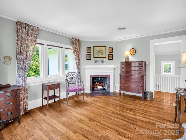 287 Pacolet Ridge Ln, Tryon, NC 28782 - living area with wood finished floors, a brick fireplace, and ornamental molding