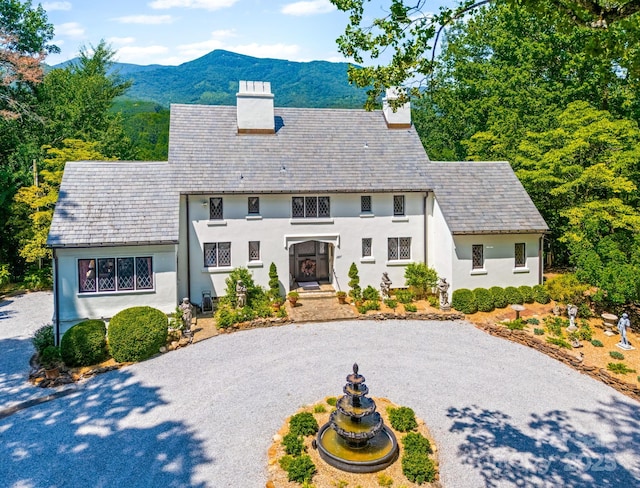 287 Pacolet Ridge Ln, Tryon, NC 28782 - tudor home with a high end roof, a chimney, driveway, and a mountain view