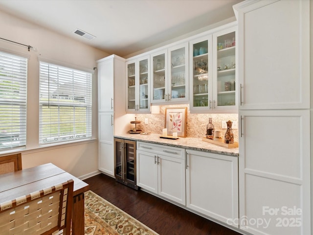 8035 Pastime Ln, Clover, SC 29710 - indoor bar with wine cooler, backsplash, and dark wood-style floors
