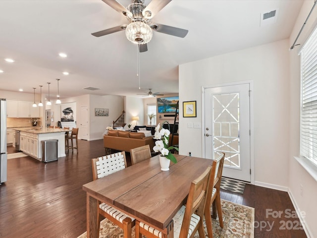 8035 Pastime Ln, Clover, SC 29710 - dining space featuring a ceiling fan, stairs, dark wood-type flooring, and recessed lighting
