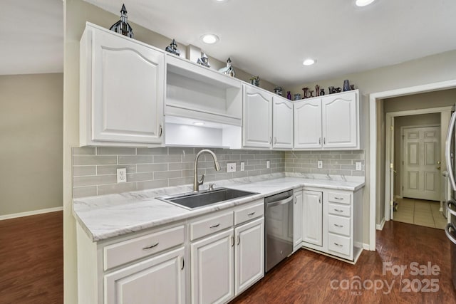 343 Stonehollow Rd, Fletcher, NC 28732 - kitchen featuring stainless steel dishwasher, white cabinets, backsplash, dark wood-style flooring, and recessed lighting