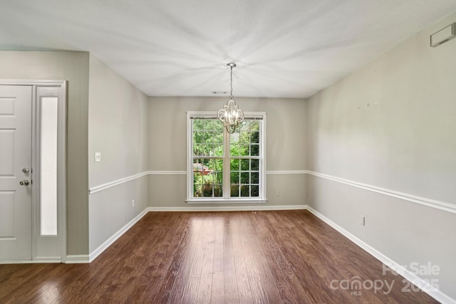 343 Stonehollow Rd, Fletcher, NC 28732 - unfurnished dining area with wood finished floors and a chandelier