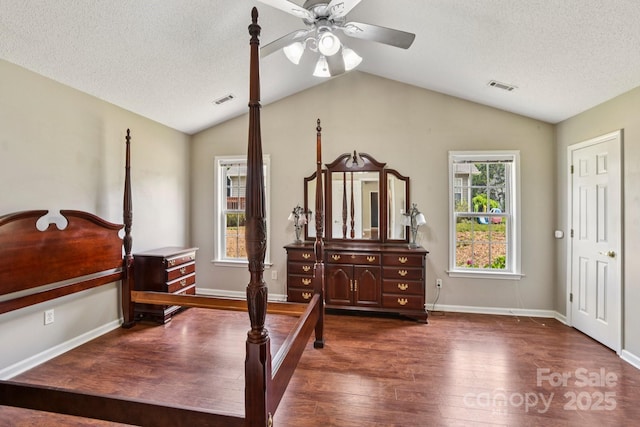 343 Stonehollow Rd, Fletcher, NC 28732 - bedroom featuring vaulted ceiling, wood finished floors, a textured ceiling, and a ceiling fan