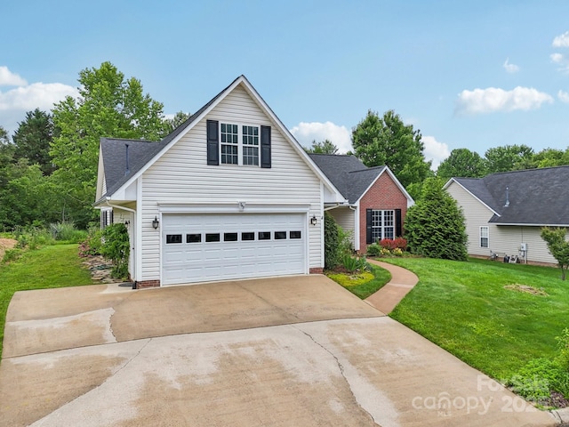 343 Stonehollow Rd, Fletcher, NC 28732 - traditional-style home with driveway, a front lawn, and a garage