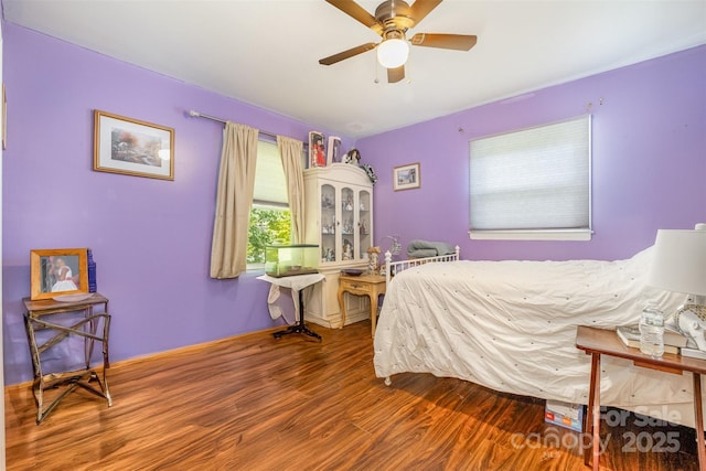 19924 Floral Ln, Cornelius, NC 28031 - bedroom featuring wood finished floors and a ceiling fan