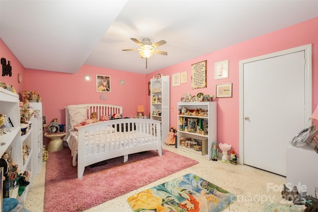 19924 Floral Ln, Cornelius, NC 28031 - bedroom with speckled floor, a ceiling fan, and a crib