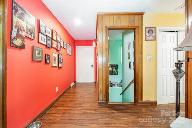 19924 Floral Ln, Cornelius, NC 28031 - hallway with dark wood-style floors and baseboards